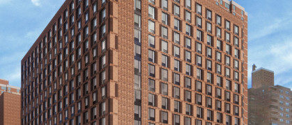 The exterior of the 16-story building at 165 Broome St.